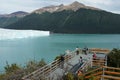 Tourists at the observation deck at Perito Moreno Glacier in the Los Glaciares National Park Royalty Free Stock Photo