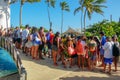 Tourists observing turtles in big tank at The Project Tamar