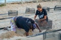 Tourists observing turtles in big tank at The Project Tamar