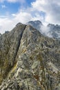 Tourists on one of the most difficult trails in the Tatras in Poland - Orla Perc Eagle`s Path. Royalty Free Stock Photo