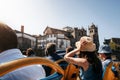 Tourists on open top sightseeing bus in city Royalty Free Stock Photo