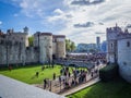 Tourists outside the main entrance (Byward Tower) of the Tower of London, a World Heritage Site. Oct