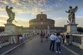 Tourists over the Castel Santangelo bridge leading to the Castel Santangelo fortress close to the Vatican City in Rome, Italy. Royalty Free Stock Photo