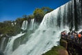 Tourists overlooking The Iguasu Falls Royalty Free Stock Photo