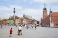 Tourists at the Palace Square in the heart of Warsaw.