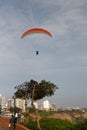 Tourists paraglide over Miraflores