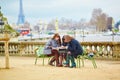 Tourists in Paris planning their trip