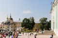 Tourists and parishioners around the bell tower. Holy Trinity-St. Sergiev Posad