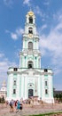 Tourists and parishioners around the bell tower. Holy Trinity-St. Sergiev Posad