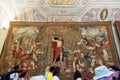 Tourists pass through one of the galleries of the Vatican Museum