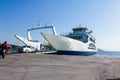 Tourists, passengers are entering ferryboat, boarding cars