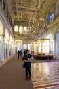 Tourists in Peacock Clock hall in Hermitage museum