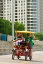 Tourists Pedal Four-Wheeled Cycle Around Chicago