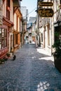 Tourists on pedestrian medieval street in Vitre