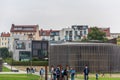 Tourists people at the Berlin Wall Memorial with background of Chapel Of Reconciliation in Berlin, Germany