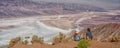 Tourists people enjoying view desert landscape of Badwater in Death Valley, USA.