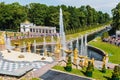 Tourists in Peterhof fountains of the Grand Cascade