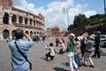 Tourists photographing the Colesseum Royalty Free Stock Photo