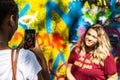 Tourists photographing in front of Lennon Wall in Prague