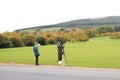 Tourists photographing golf club in Powerscourt Estate- Autumn colors - County Wicklow - Ireland fall tour - No. 3 garden in world