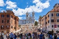 Tourists on Piazza di Spagna at the bottom of the Spanish steps in Rome, Italy Royalty Free Stock Photo