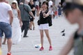 Tourists and pigeons in Venice, Italy Royalty Free Stock Photo