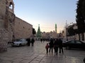 Tourists and pilgrims outside Church of Nativity in Bethlehem, Palestine on Christmas eve