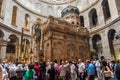 Tourists and pilgrims stand in line waiting to enter Jesus's empty tomb, where he is said to have been buried and resurrected in