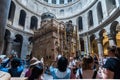 Tourists and pilgrims taking pictures of tthe Aedicule, Jesus's empty tomb, where he is said to have been buried and resurrected