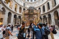 Tourists and pilgrims taking pictures of tthe Aedicule, Jesus's empty tomb, where he is said to have been buried and resurrected