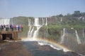 tourists on platform in waters of Iguacu river, at Iguacu falls, Brazil Royalty Free Stock Photo