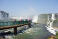 tourists on platform in waters of Iguacu river, at Iguacu falls, Brazil Royalty Free Stock Photo