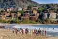 Tourists play games on the beach in Ixtapa, Mexico. Royalty Free Stock Photo