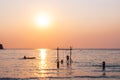 Tourists play in the water sea during the sunset at area ao bang bao Koh kood island Trat, Thailand Royalty Free Stock Photo