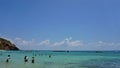 Tourists playing in the afternoon sea