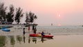 Tourists playing kayaks at Cam Ranh bay in Nha Trang, Vietnam