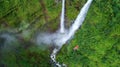 Tourists are playing zip line waterfall in Laos,Rainforest, Asia