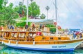 The tourists in pleasure boat