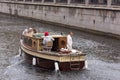 Tourists on a pleasure boat ride along the Griboyedov Canal in Saint Petersburg, Russia Royalty Free Stock Photo