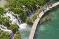 Tourists in Plitvice lake (Plitvicka jezera)