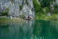 Tourists at Plitvice Lakes, Croatia. Royalty Free Stock Photo