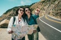 Tourists pointing to somewhere ahead excitingly Royalty Free Stock Photo