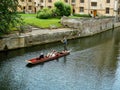 Tourists punting in Cambridge