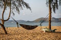 Tourists put their hammocks and put them on the beach to lie down at the beach in Sattahip District Royalty Free Stock Photo