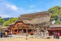 Tourists queing to praying in the Japanese Dazaifu shrine dedicated to Sugawara no Michizane. Royalty Free Stock Photo