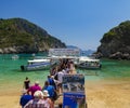 Tourists queue for boats in Palaiokastritsa, Corfu