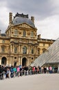 Tourists queuing for the Louvre