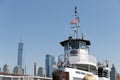 Tourists queuing to Miss Liberty boat in Battery Park. Royalty Free Stock Photo