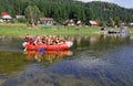 Tourists on the raft set sail from the coast on the river Biya Royalty Free Stock Photo