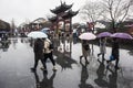 Tourists in the rainy days of Confucius Temple Scenic Spot